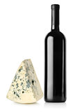 Bottle of red wine and blue cheese