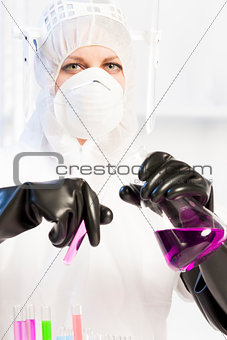 young woman wearing protective clothes in laboratory
