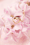Gold necklace with heart on hyacinth