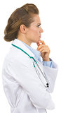 Thoughtful medical doctor woman