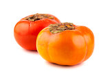Two ripe persimmon fruits