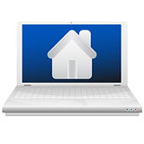 Laptop and house. Real estate concept.