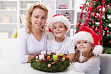 Christmas time - family with advent wreath