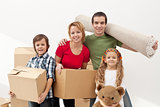 Happy family moving into a new home