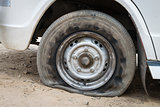 Deflated damaged tyre