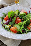 salad mix with avocado tomato and cucumber
