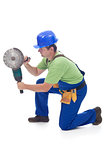 Worker using power tool