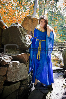 medieval princess in stone garden