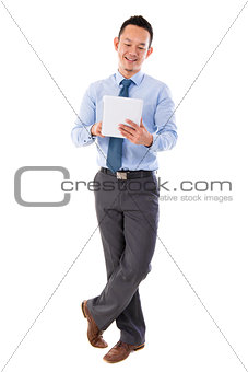  Asian businessman using tablet-pc