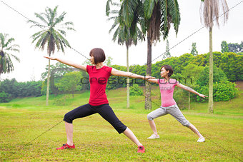 Asian girls yoga outdoor 