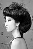 Asian Woman With High Styled Hair