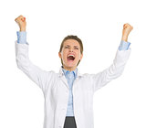Happy woman in white robe rejoicing success