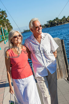 Happy Senior Couple Walking Tropical Sea or River
