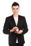 Young man holdin red box with ring