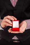 Man holding box with wedding ring