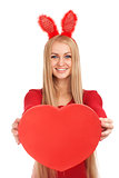 Beautiful young with valentines heart in hands