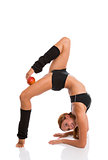 Flexible woman with red apple