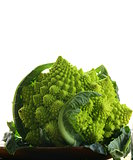 head of cabbage romanesco on wooden plate