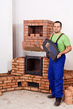 Mason building fireplace