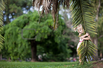 girl with a palm leaf