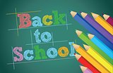 back to school with colors pencils over chalkboard