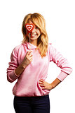 Attractive girl holding Valentine's day decoration