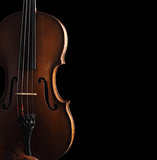old violin on dark background