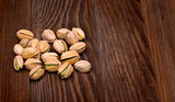  pistachios on  wooden  background