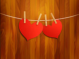 Two red loving hearts hanging on a rope. Vector illustration