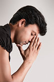 Indian man thinking position with closed eyes