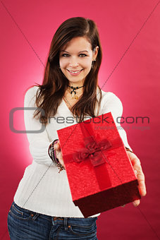 Smiling female with christmas gift