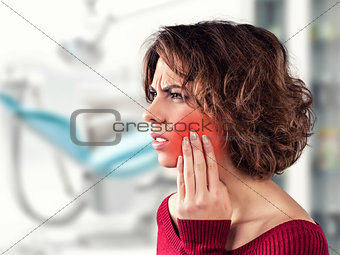 Girl with a painful tooth