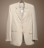 Beige jacket on hanger with Clipping path