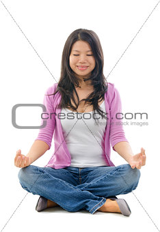 Asian Chinese woman yoga lotus pose
