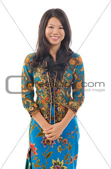 Southeast Asian woman in traditional batik kebaya