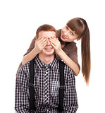 Woman covering mans eyes