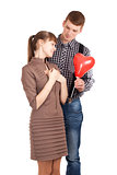 Happy couple with heart shape balloon