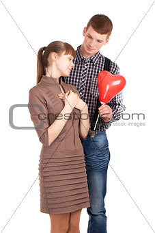 Happy couple with heart shape balloon