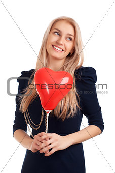 Young woman with heart shape balloons