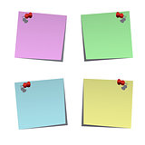 Set of blank post-it notes with push pins