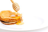 Delicious Freshly Prepared Pancakes with Honey