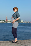Pregnant Woman on Pier