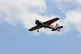 RC model airplane flying in the blue sky