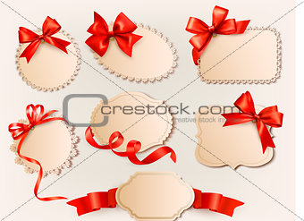Set of beautiful retro labels with red gift bows with ribbons. Vector illustration.