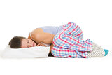 Young woman in pajamas sleeping on pillow isolated on white