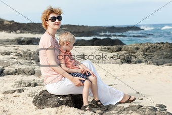 family at the hawaiian beach