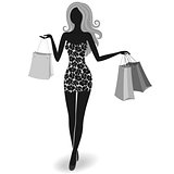 Silhouette of a shopping girl