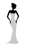Silhouette of a girl in white evening dress