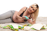 pregnant woman lying on the carpet