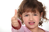 Little girl giving the thumbs-up